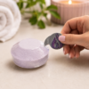 Serene Flame shrink wrap opener being used on a wrapped shower steamer
